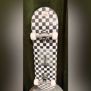 Checkered Skateboard with White Wheels